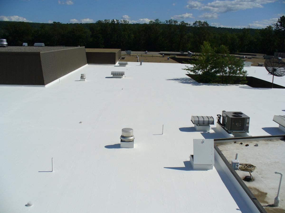 Commercial flat roof with new liquid applied membrane