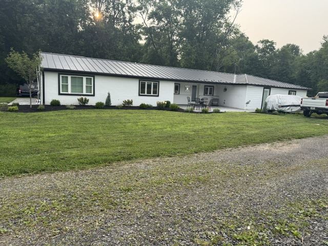Ranch home with a new standing seam metal roof